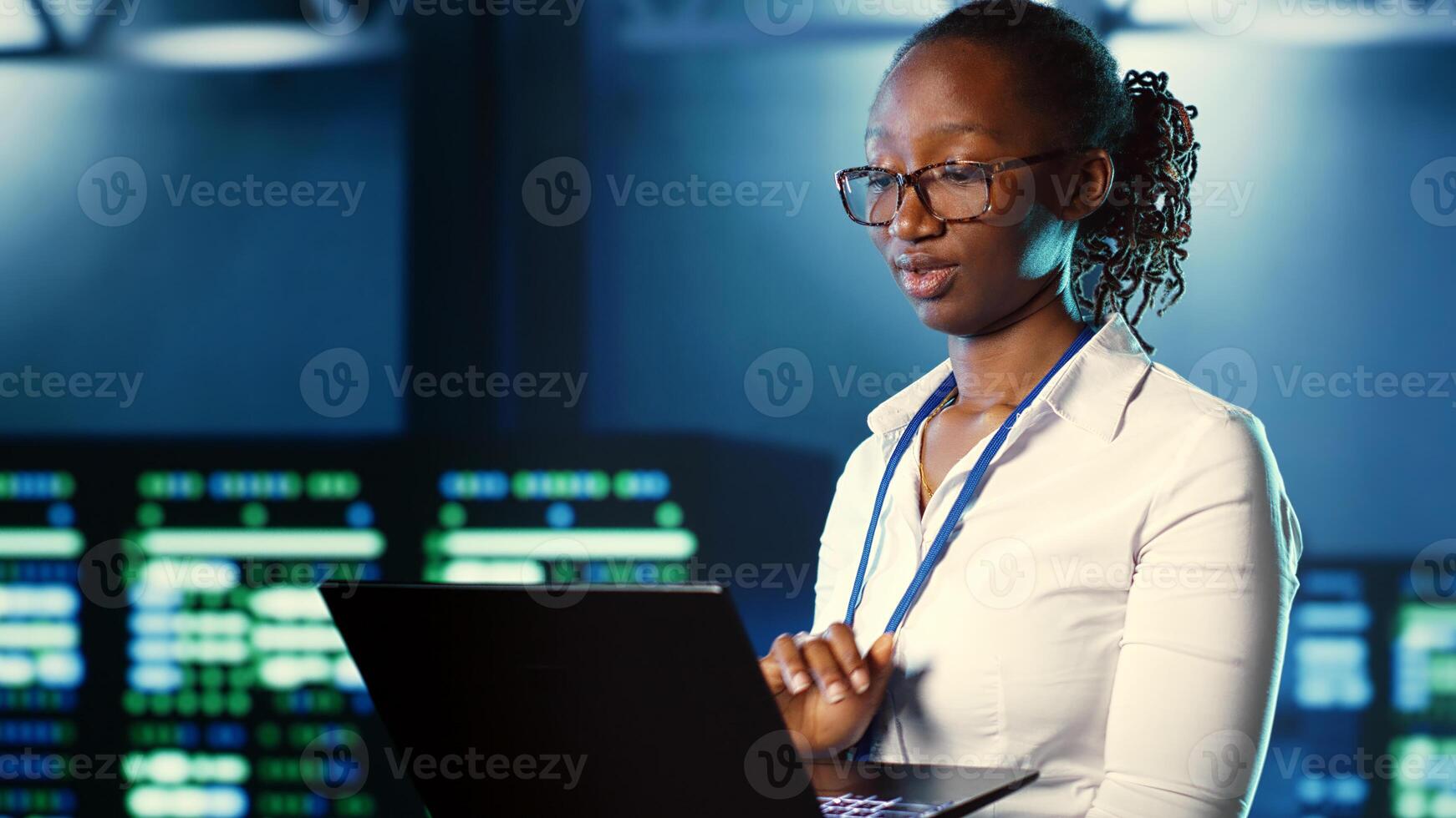 Woman walking through high tech facility server rows providing computing resources for different workloads. Admin reviewing data center supercomputers tasked with solving complex operations, close up photo