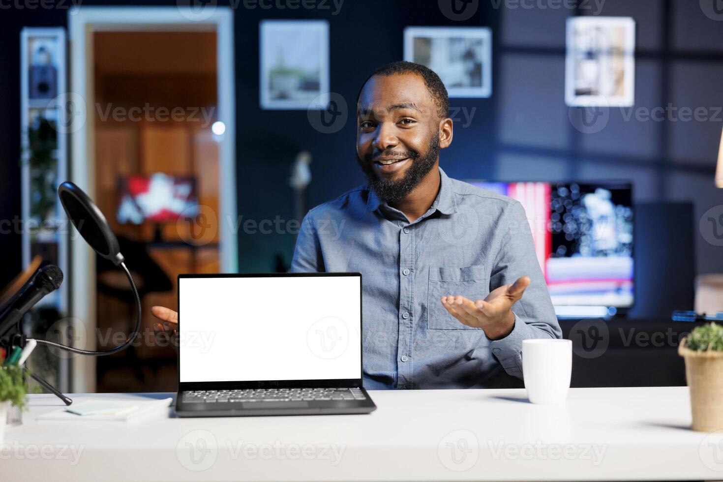 Internet show host being sponsored by partnering brand to do mockup laptop unboxing content. Tech specialist does influencer marketing, doing isolated screen notebook product placement photo