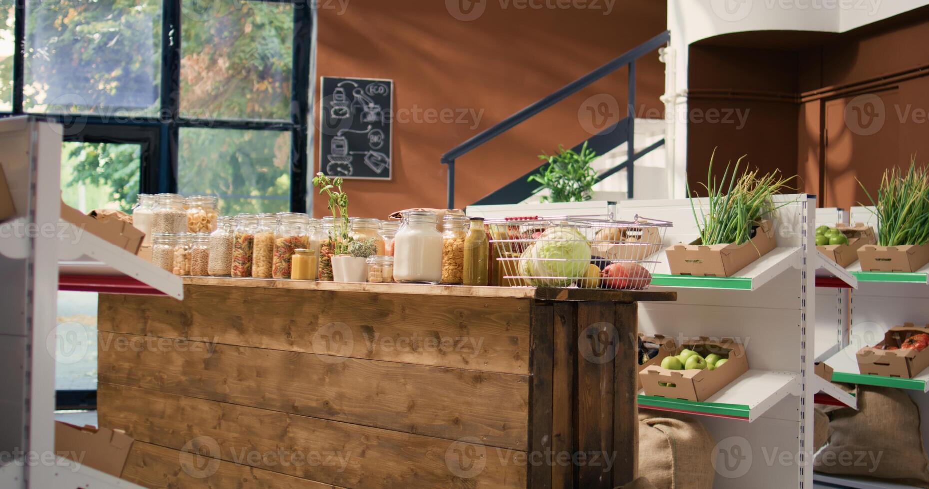 Additives free pasta and vegetables in natural zero waste eco store. Organic locally grown produce and homemade spices placed in reusable packaging, empty sustainable lifestyle shop. photo
