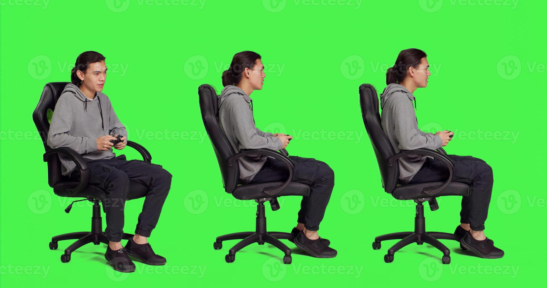 Happy adult has fun with online gameplay, sitting on gaming chair over full body isolated greenscreen in studio. Asian person enjoying multiplayer competition, man playing videogames. photo