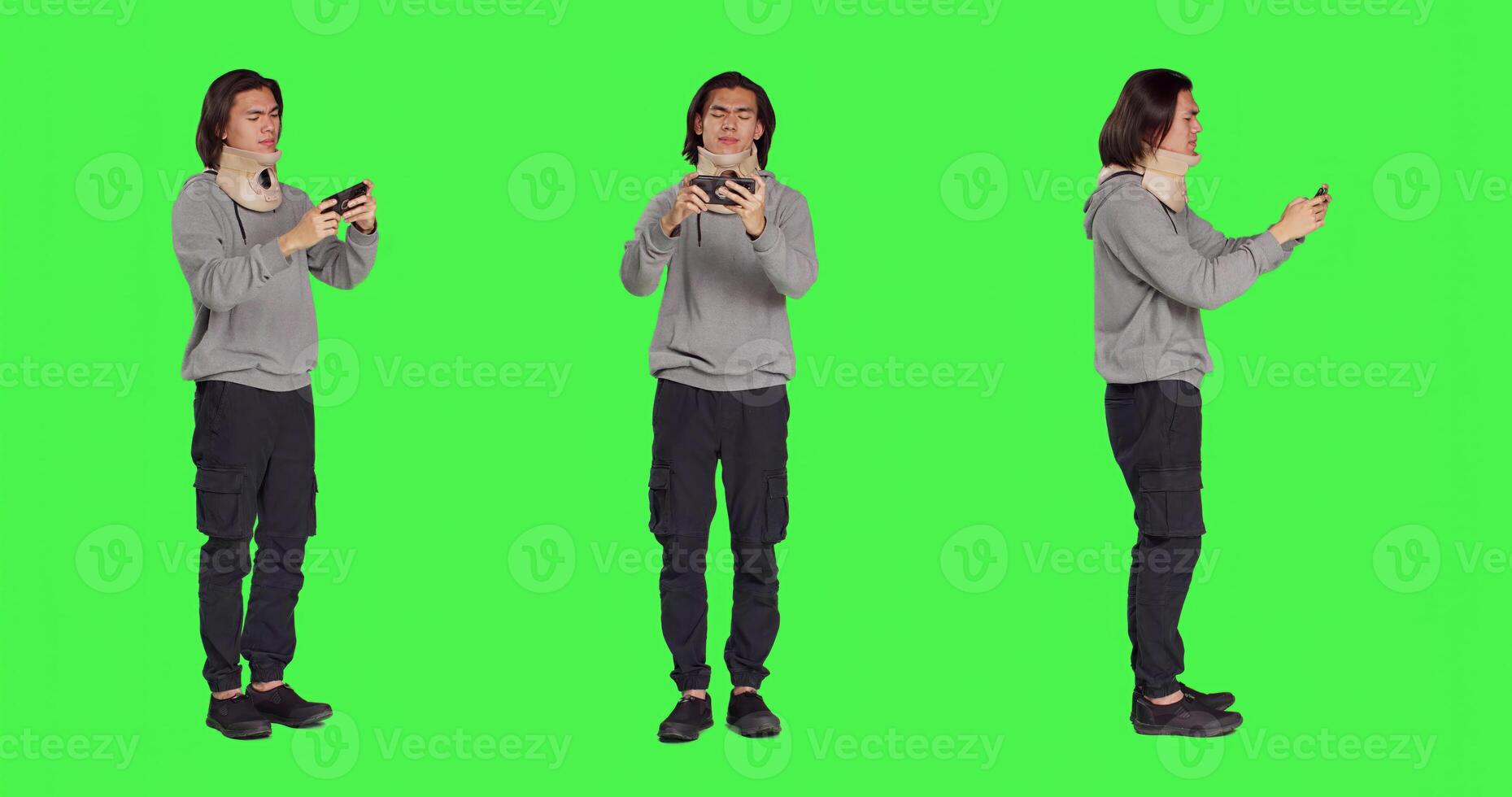 Injured adult with cervical neck collar on videocall against greenscreen template, talking on online web conference call while he wears medical foam brace after fracture. Guy with bone injury. photo