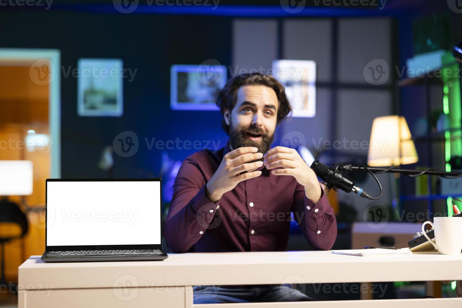 Excited tech specialist assessing mockup smartphone performance, feeling satisfied with high quality components used. Entertainer shooting isolated screen phone review for internet channel photo