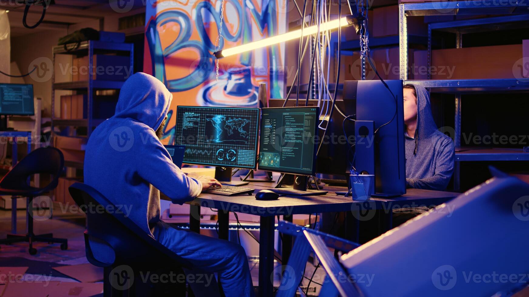 Hackers doing computer sabotage using encryption trojan ransomware in hidden base. Cybercriminals demanding ransom money from victims in exchange for access to their data photo