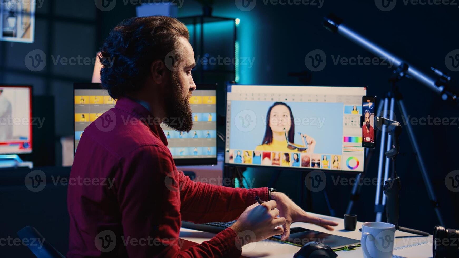 Content creator phot editor filming daily vlog in post production company using smartphone. Photographer teaching audience photography tips, recording with mobile phone on tripod photo