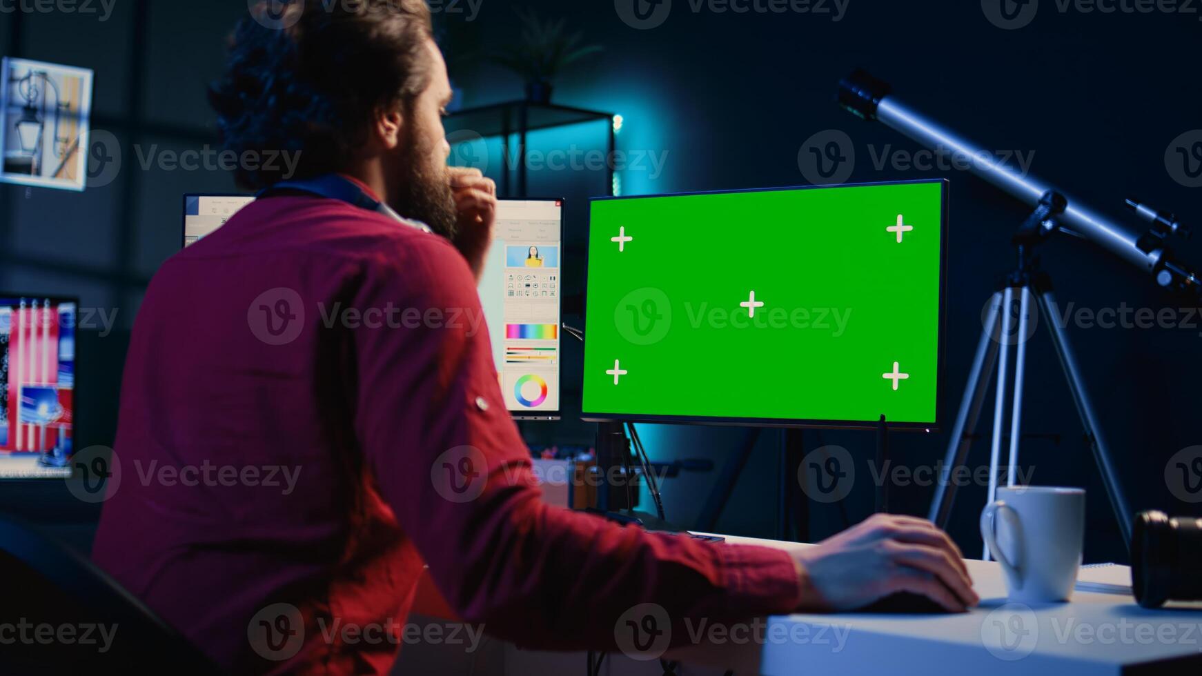 Photo editor using mockup PC monitor to color correct photographs in creative media agency. Photographer selecting best pictures for editorial content with isolated screen computer display