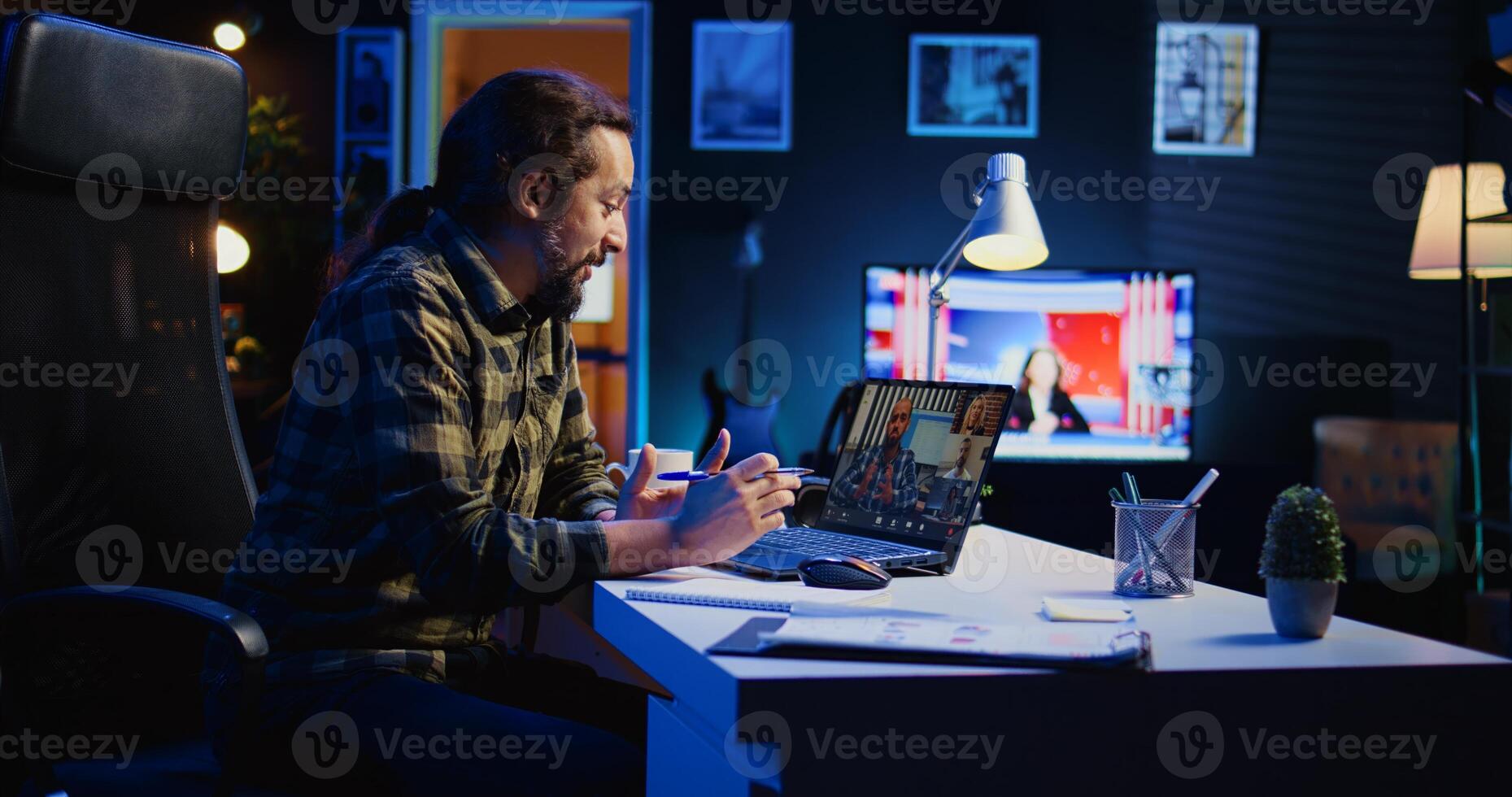 Remote employee making report to board of directors during company meeting on videocall. Man working from home participating in corporate remote videoconference call, presenting project, camera B photo