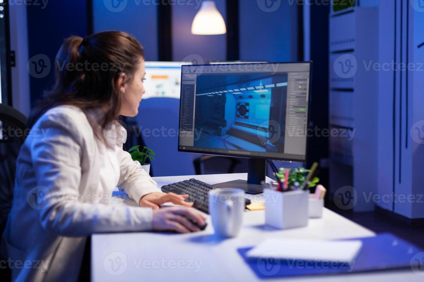 Editor developing new movie project, editing audio film montage sitting in production office late at night. Creative content creator using professional computer, modern technology, network wireless photo