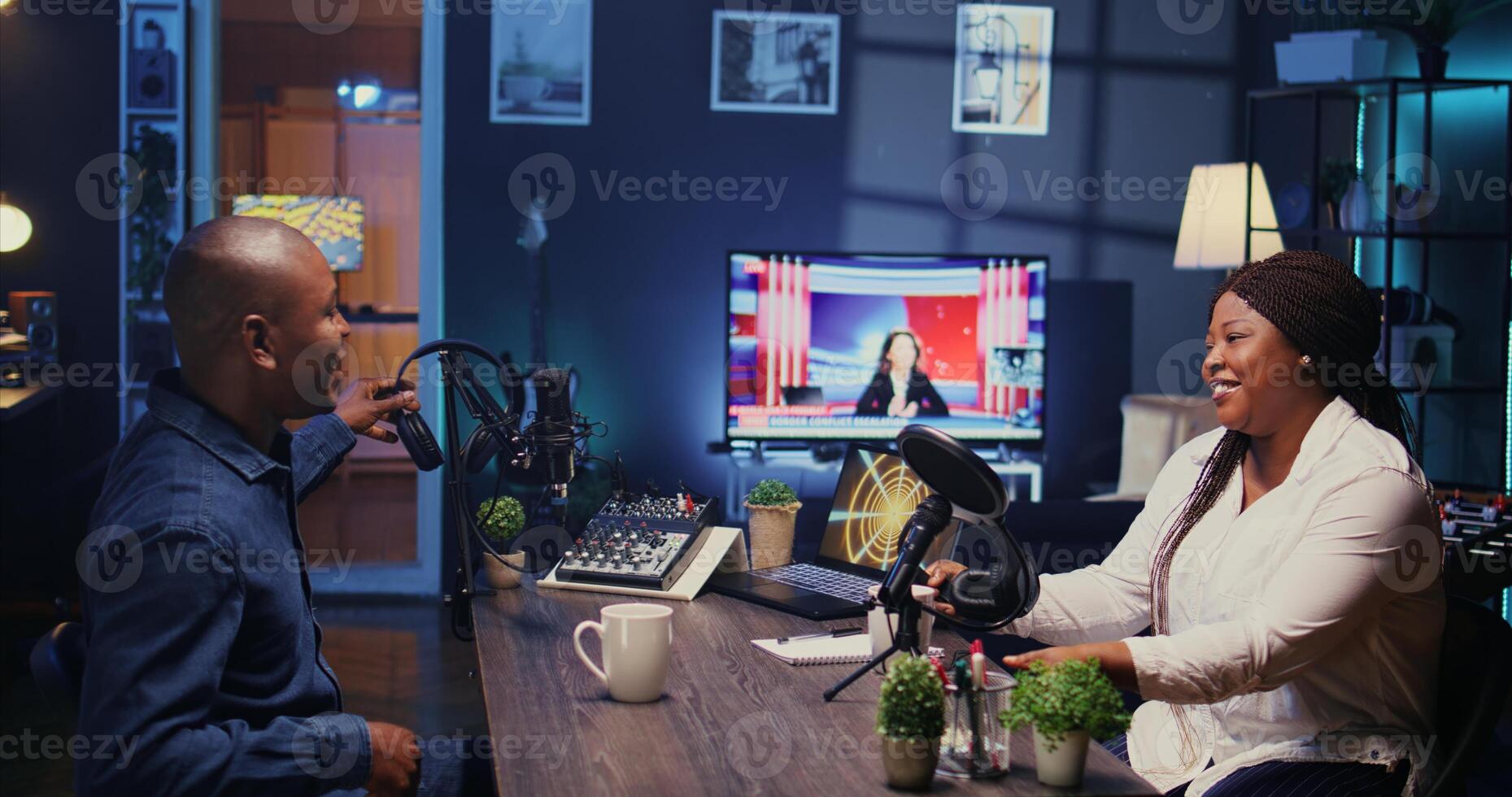 Content creators arriving in studio, ready to use high tech microphone for online show on livestreaming channel. Man and woman starting podcasting session with professional streaming sound gear photo