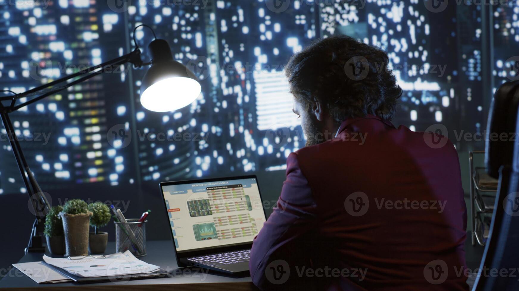 Economic specialist works on financial management at desk, creating an organizational structuring plan to increase profit internationally. Chief financial director developing company funds. photo