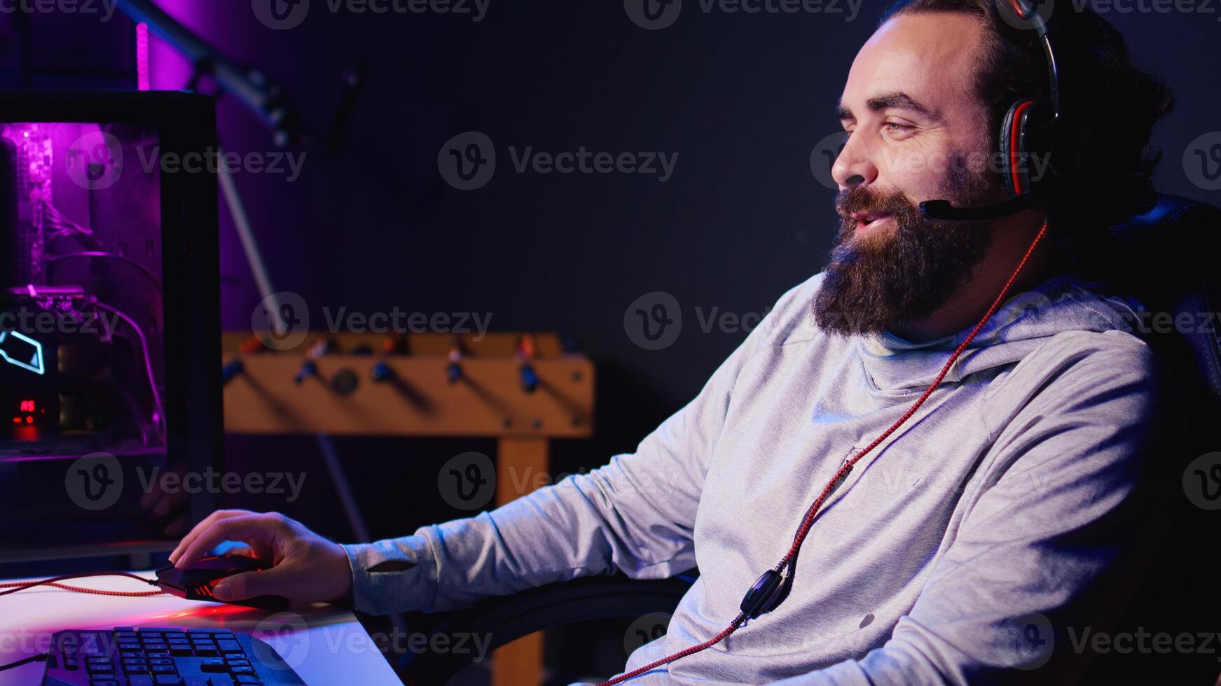 Man talking with friends online while playing singleplayer videogame with spaceship shooting laser bullets at asteroids. Gamer chats with teammates while hitting targets in SF game photo