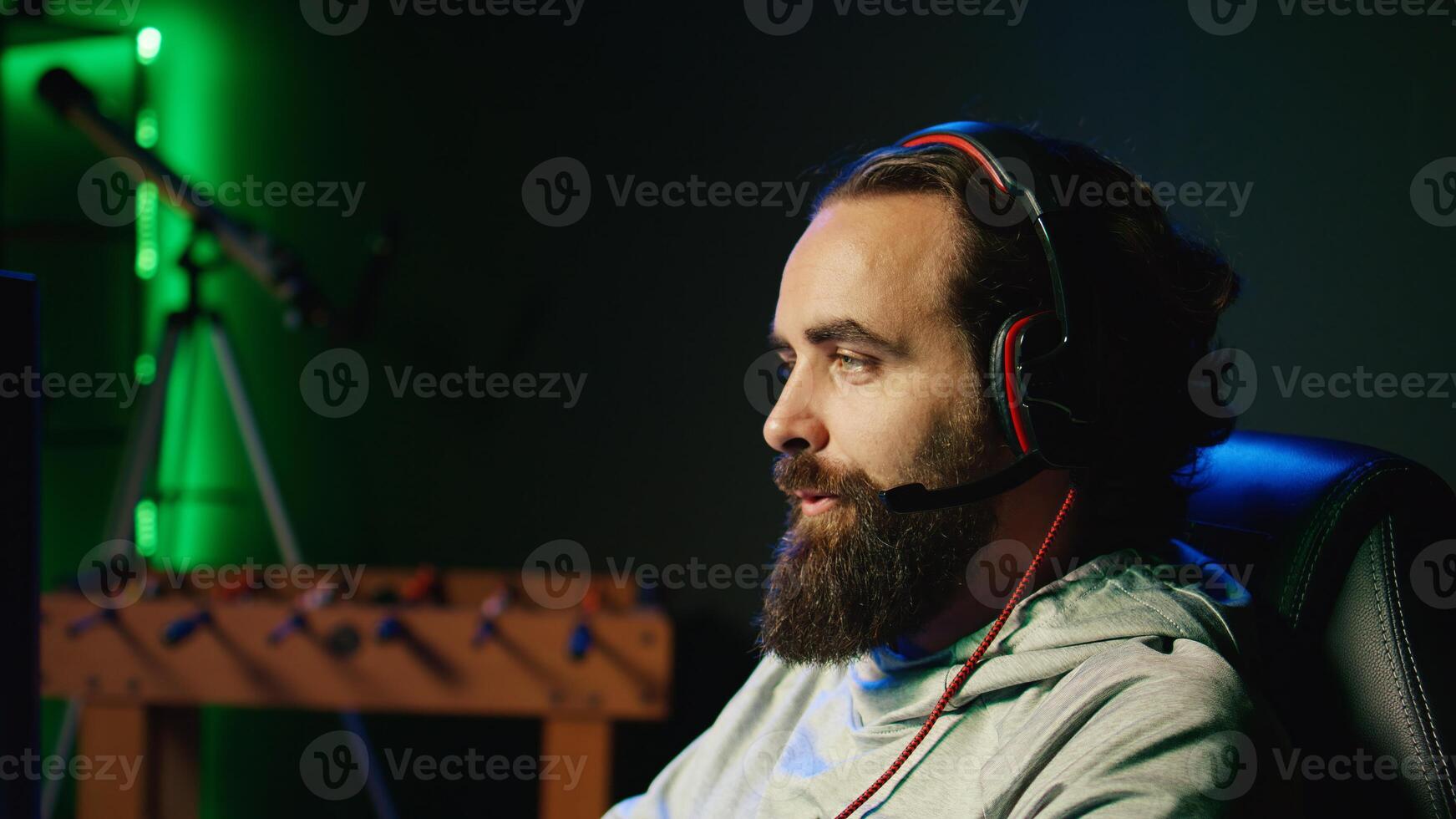 Gamer talking with friends, destroying enemy spacecrafts together, trying to finish level in flying game. Close up of player fighting boss in singleplayer videogame, solving missions to save galaxy photo