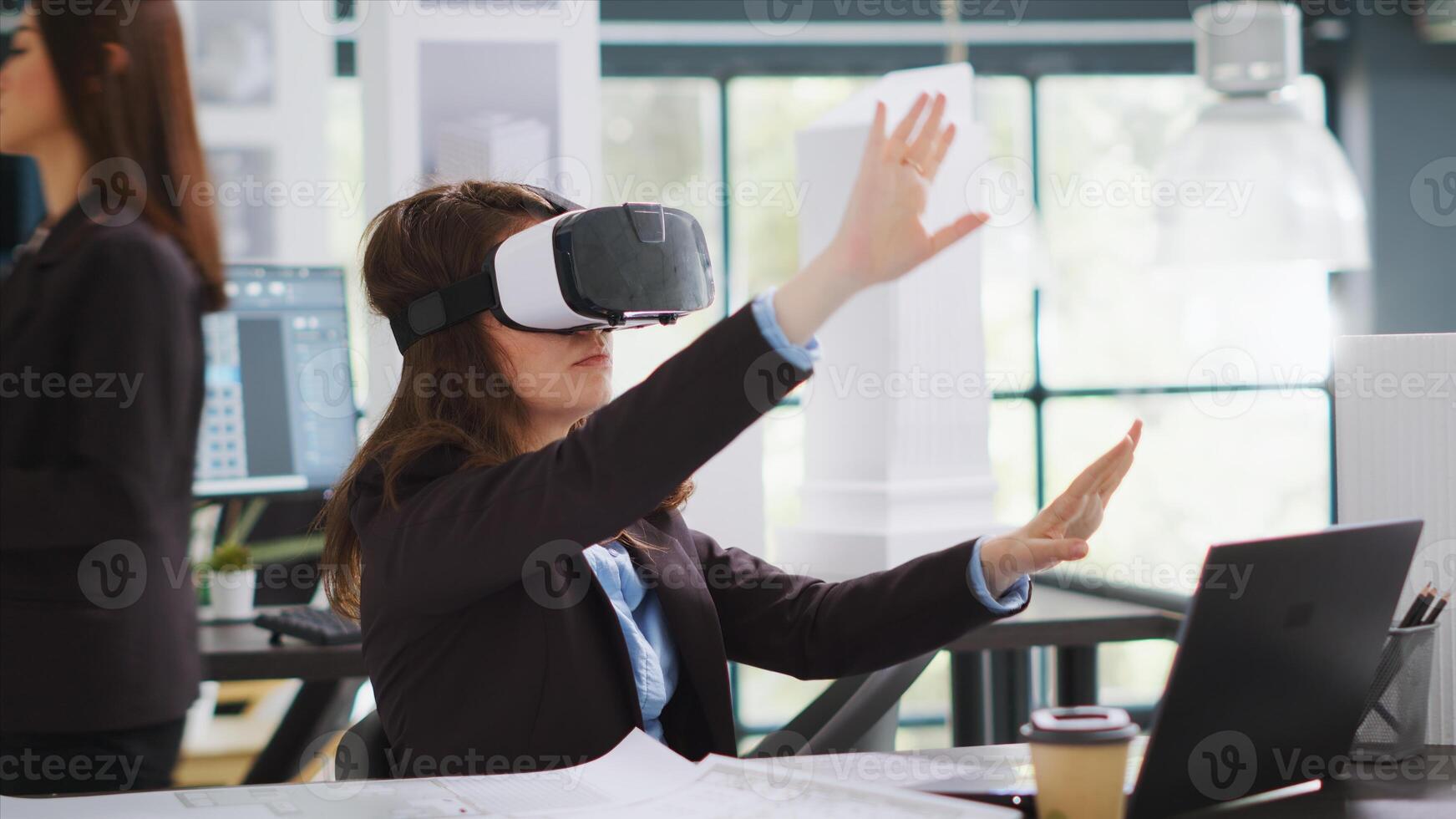 Architect designing project blueprints and plans with vr headset, using artificial intelligence to shape new property layout. Specialist working with virtual reality glasses at real estate agency. photo