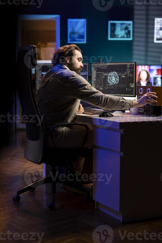 Developer inserting disk into PC containing language data models able to create conscient AI. IT admin placing cartridge in computer with machine learning data awakening artificial intelligence photo