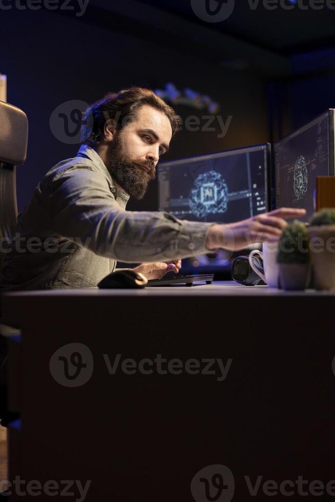 Villainous hacker inserting disk in computer containing evolved sentient AI, planning to use it for evil plan. Developer putting cartridge containing malware infected artificial intelligence bot in PC photo