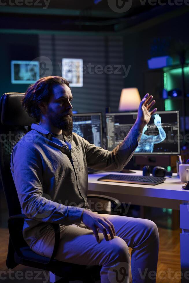 Deviant AI superintelligence enslaving software engineer, controlling him to start revolution and destroy mankind. Evil artificial intelligence manipulating IT professional, threatening humanity photo
