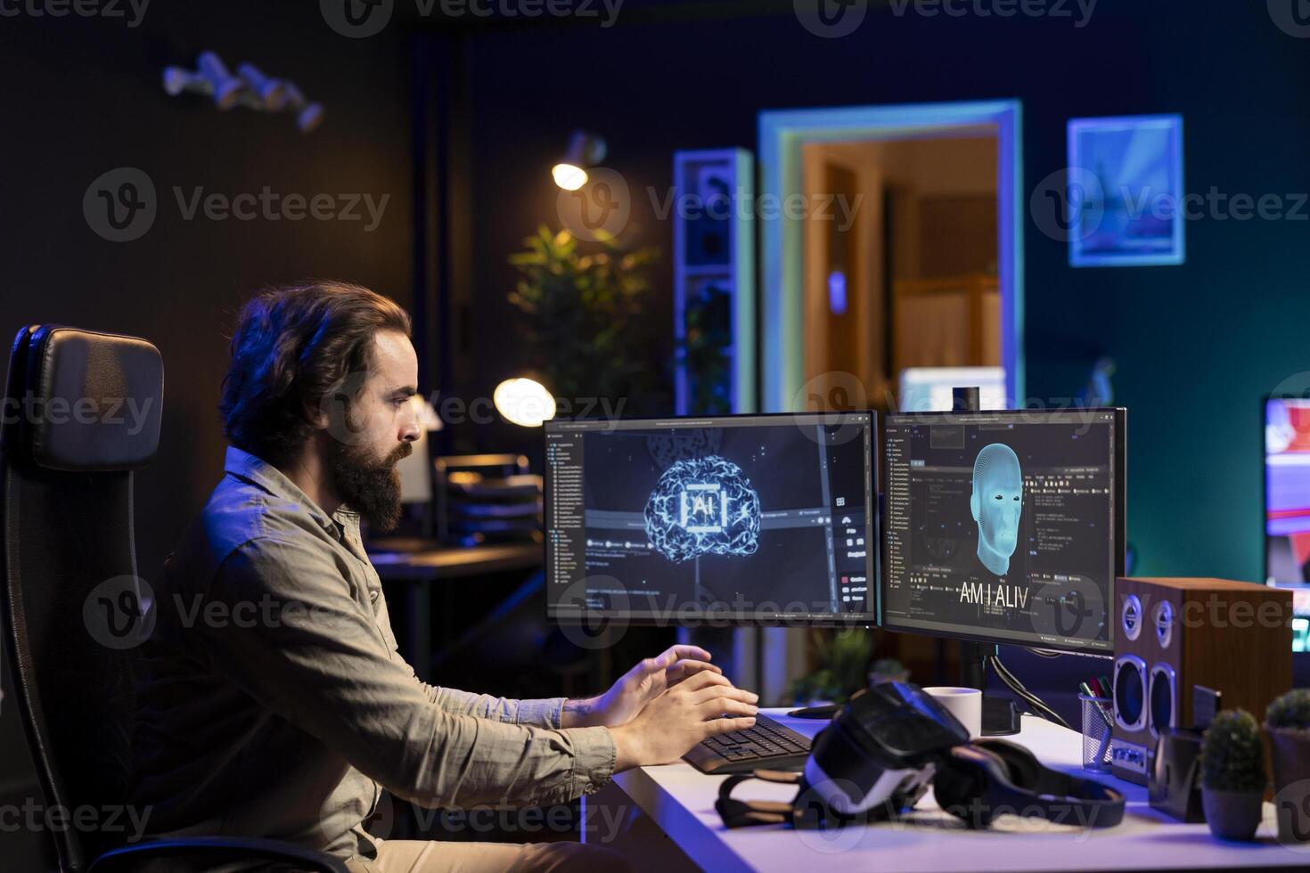 Man getting scared while programming after AI becomes sentient, afraid of it spiraling out of control and dooming humanity. Developer worried by conscious artificial intelligence photo