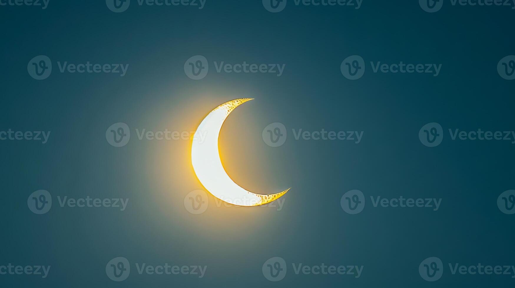 Partial solar eclipse against a dark sky. Bright crescent sun during an eclipse. Concept of astronomy, celestial event, solar phenomena, and natural wonder photo