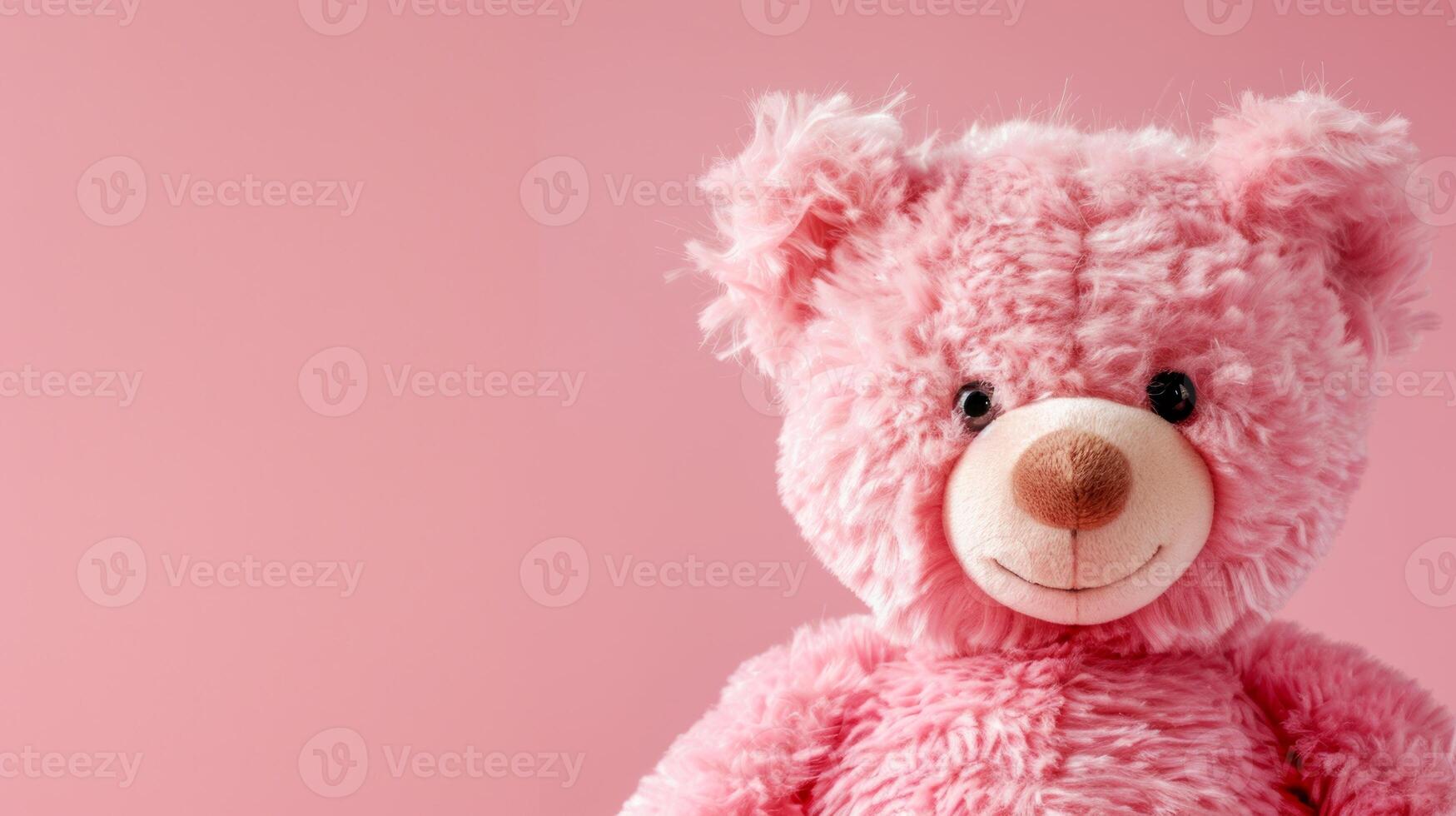 Fluffy pink plush bear on a pastel background. Cute and cuddly toy for children. Concept of childhood, innocence, playtime, comfort. Copy space photo