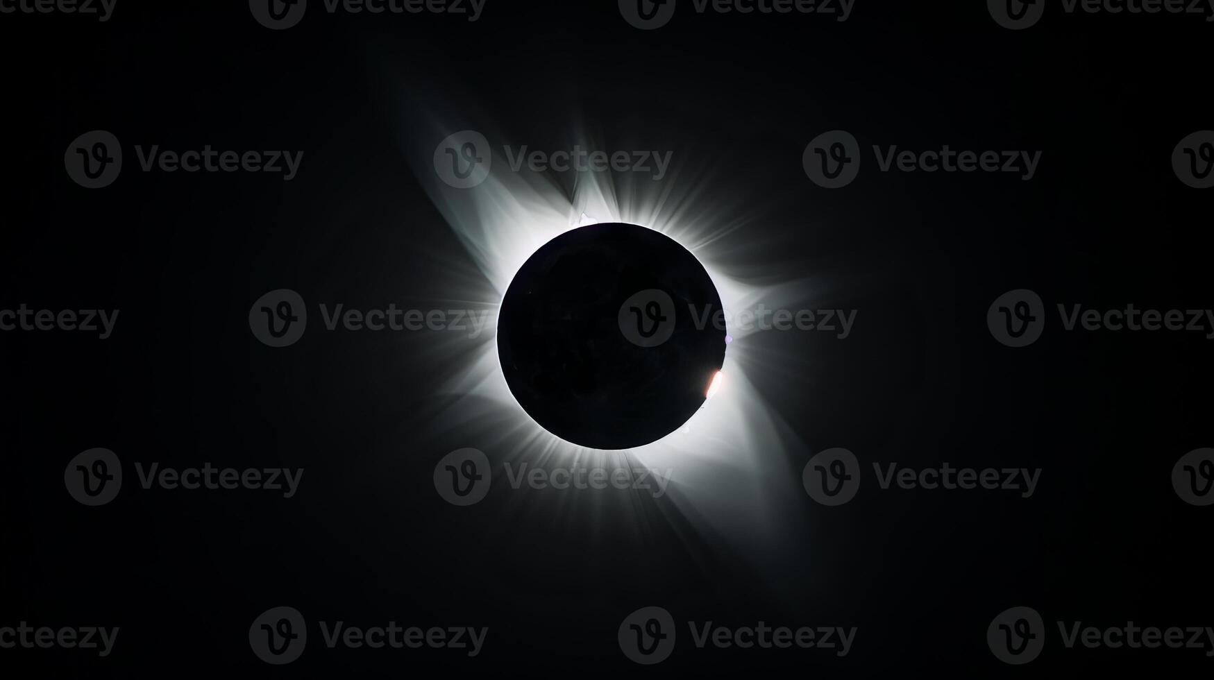 Total solar eclipse with visible sun corona. Complete solar eclipse. Concept of astronomy, celestial event, solar phenomenon photo