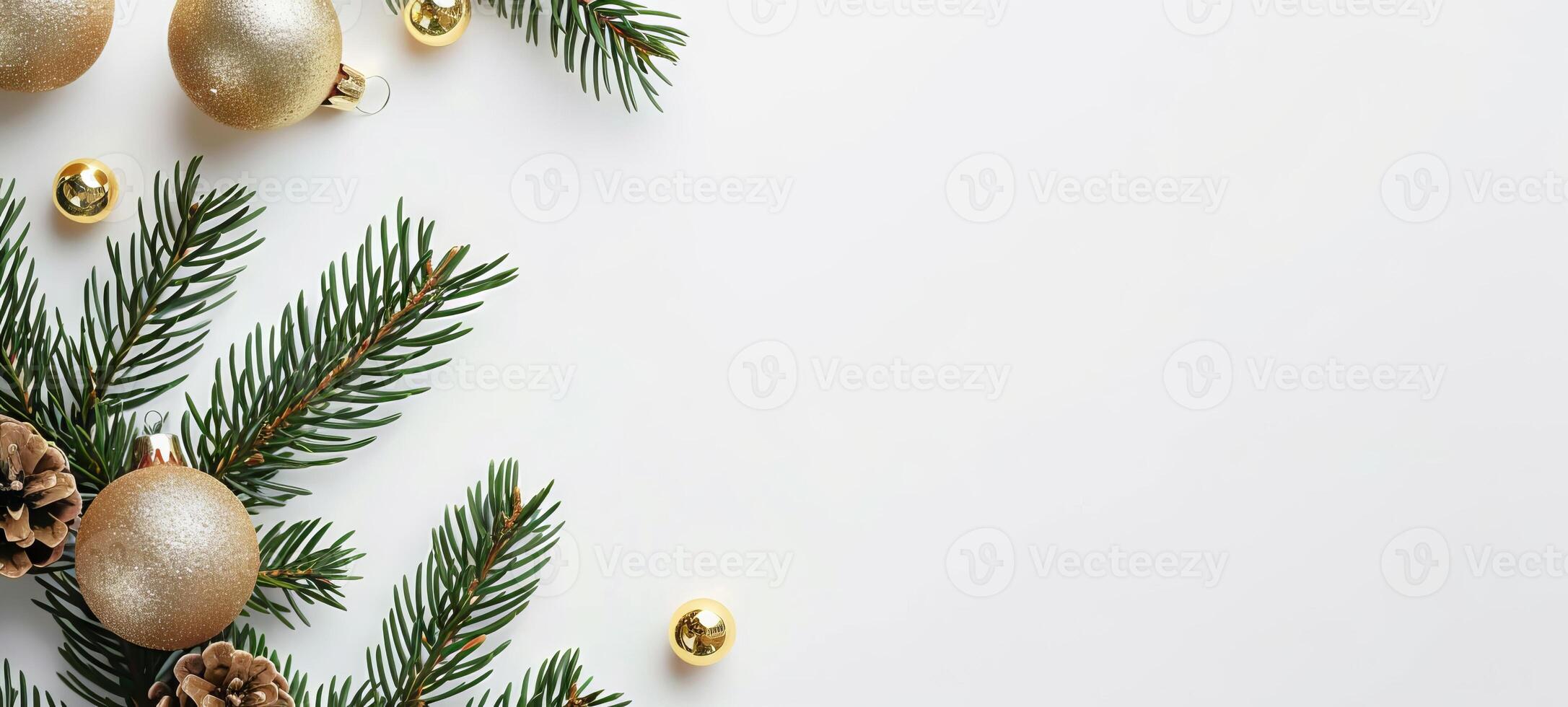 Sparkling gold Christmas ornaments with pine branches and pine cones on a white background. Concept of holiday decoration, festive season, winter celebration, Christmas design. Banner. Copy space photo
