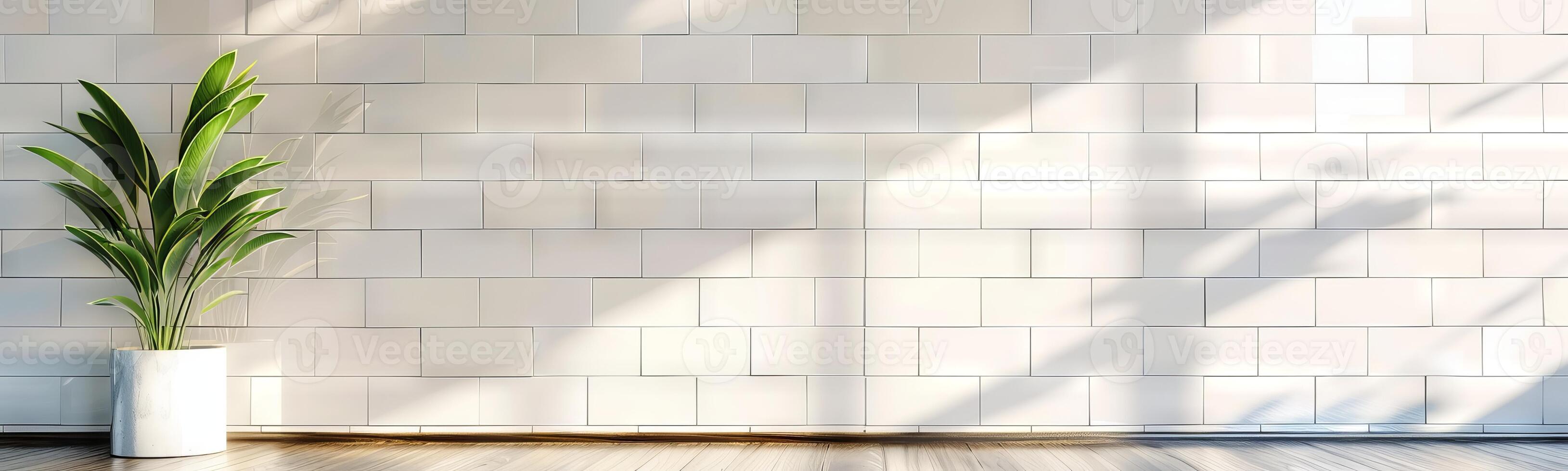 A potted plant with green leaves against a modern light-tiled wall. Minimalist interior decor. Concept of nature, calm, simple design, contemporary. Banner. Copy space. Mockup photo