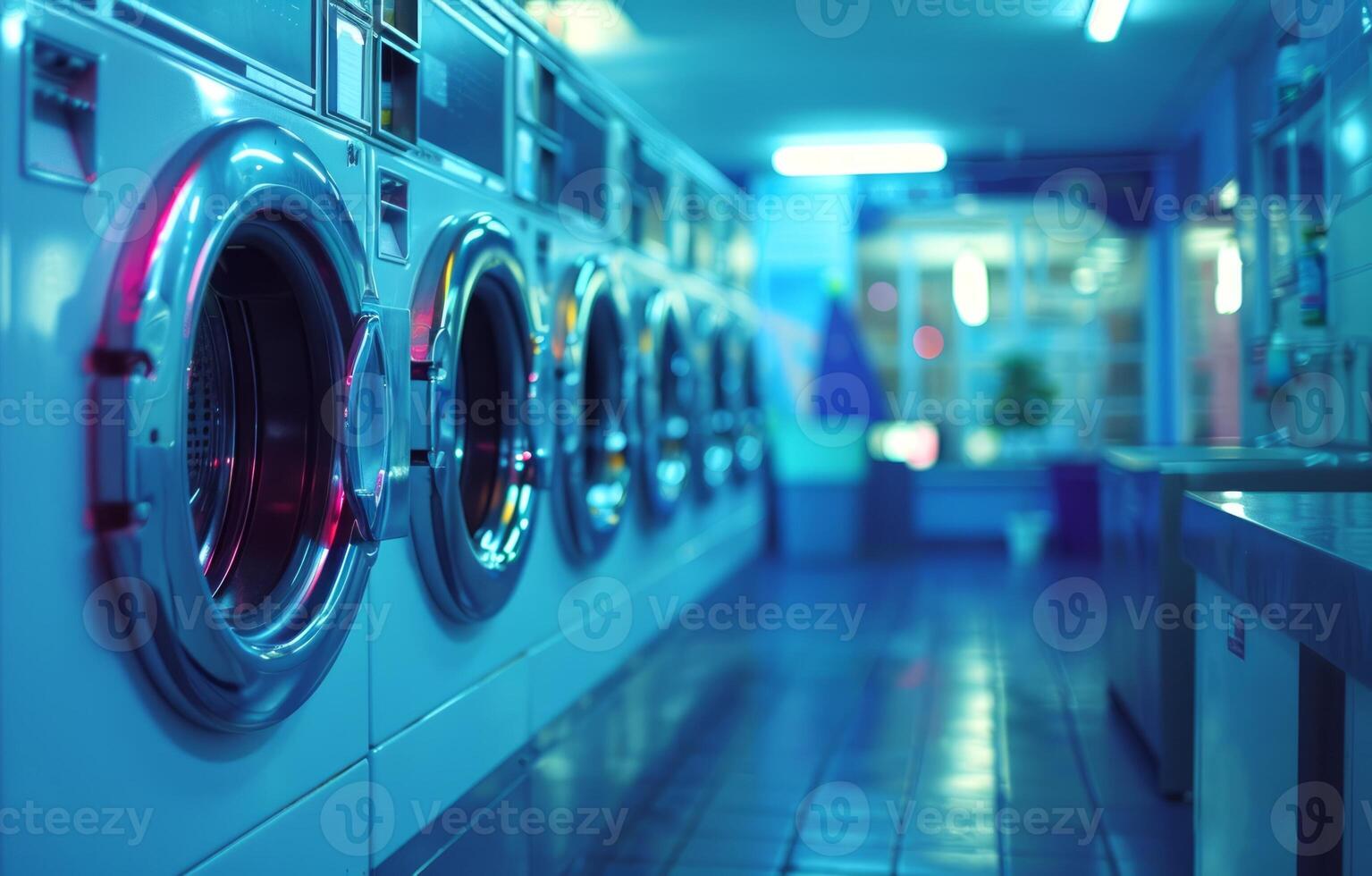 Sleek and modern laundromat equipped with high-tech machines. Public laundry environment. Concept of advanced technology, public utility, efficiency. photo