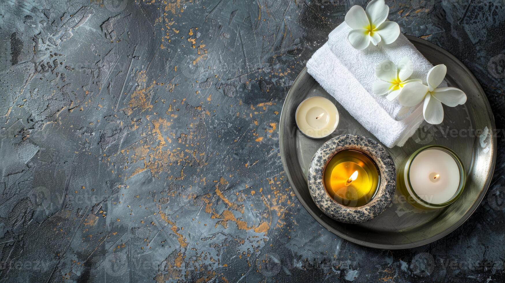 Spa essentials on a tray on a dark textured background. Candles, towels, and essential oil set for relaxation. Concept of spa treatment, wellness, and serene decor. Banner. Copy space photo