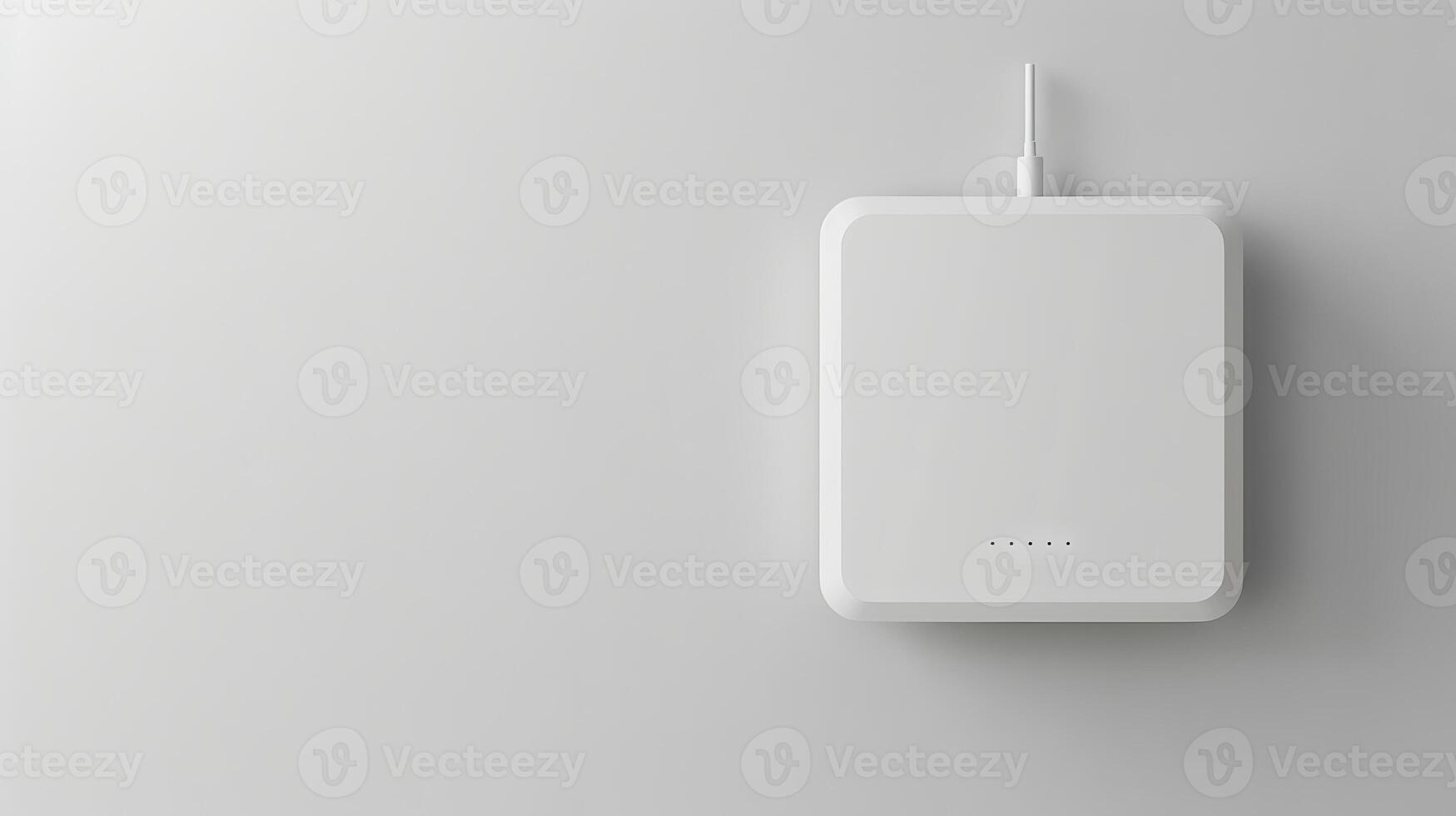 Minimalistic white Wi-Fi router against a plain white wall. Concept of modern technology, wireless internet, connectivity, sleek design. Copy space photo