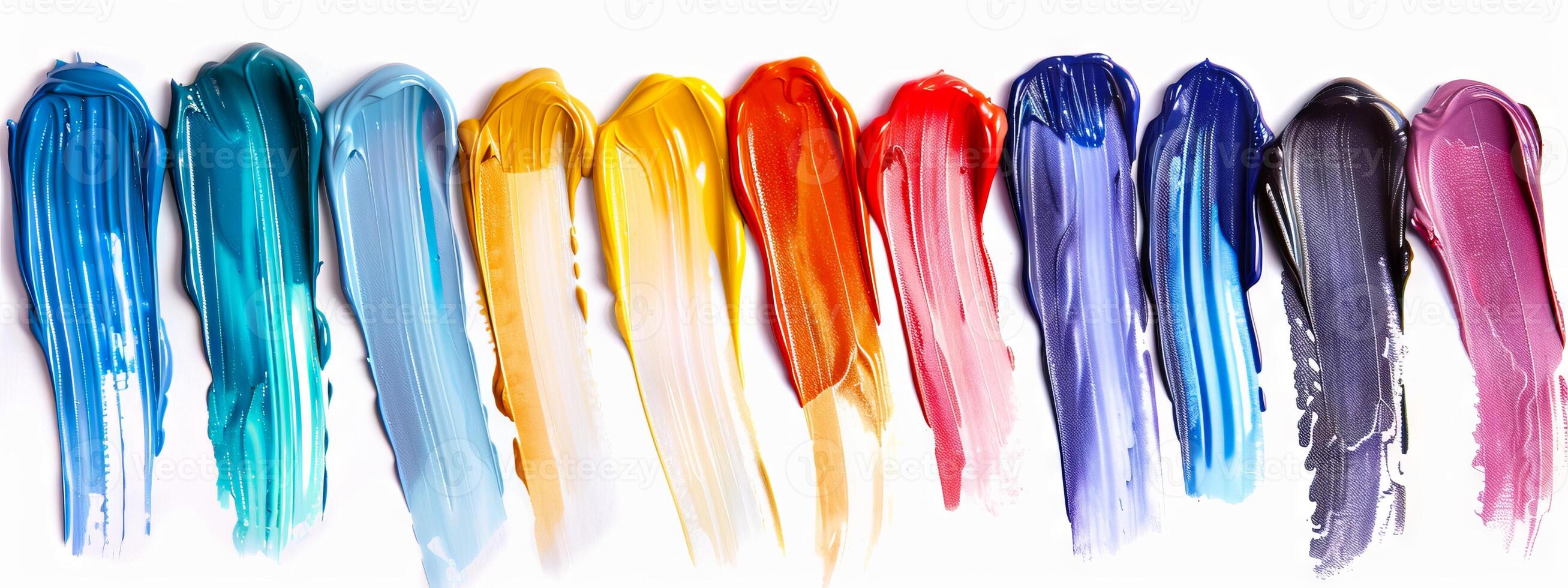 Colorful oil paint strokes in a row on a white background. Concept of vibrant art, painting materials, creative expression, abstract design. Paint stains isolated on white photo
