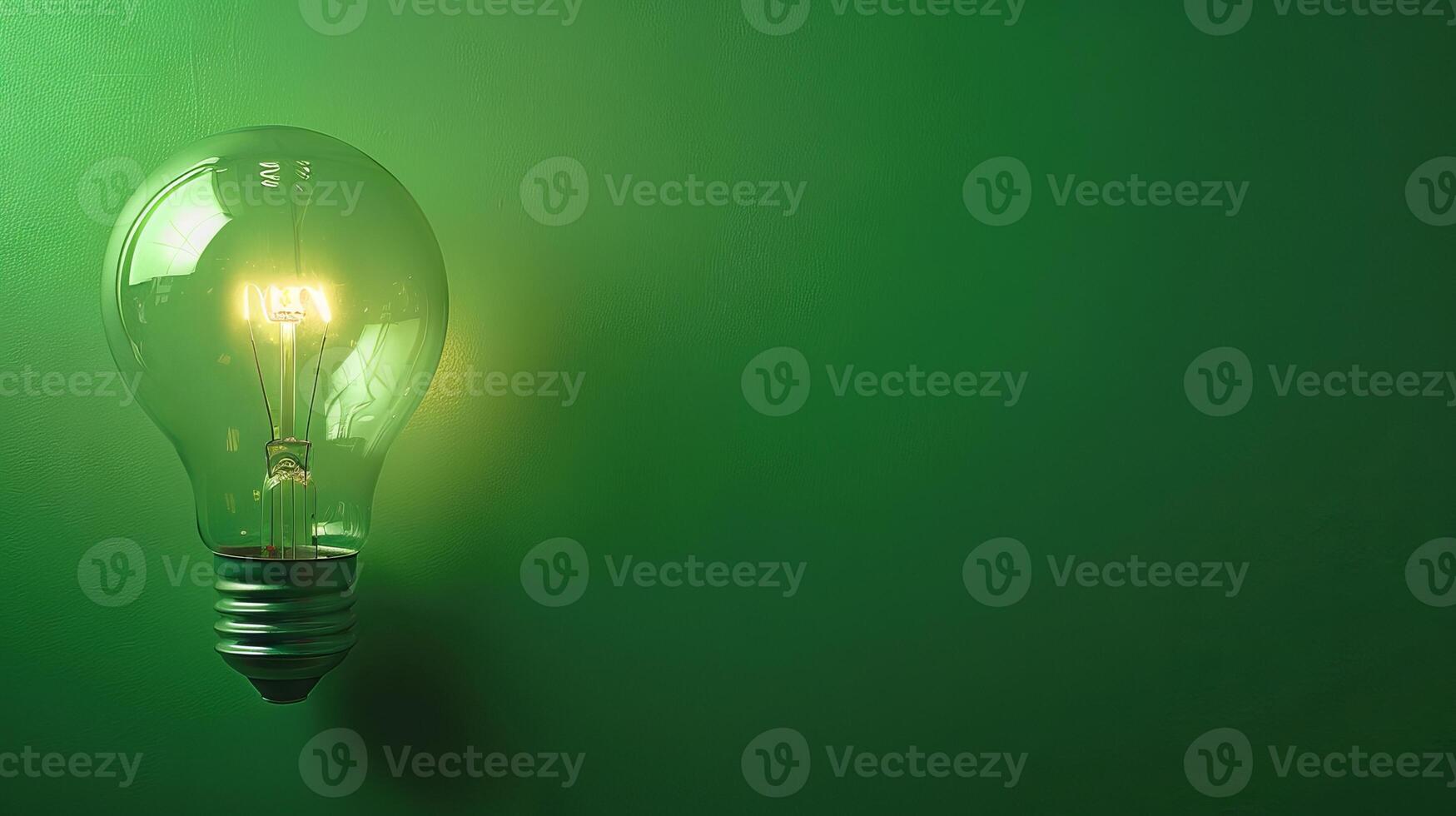 Glowing light bulb on green background. Concept of innovation, energy, efficiency, ideas, creativity. Copy space photo