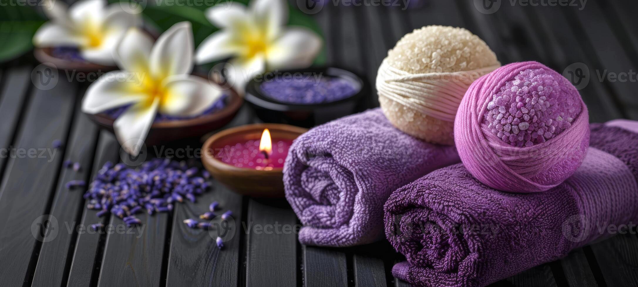 Peaceful spa setting with lit purple candles, orchid flowers, aromatic bath salts. Calming wellness retreat for relaxation. Concept of luxury Thai spa, tranquility, self-care, health retreat. photo