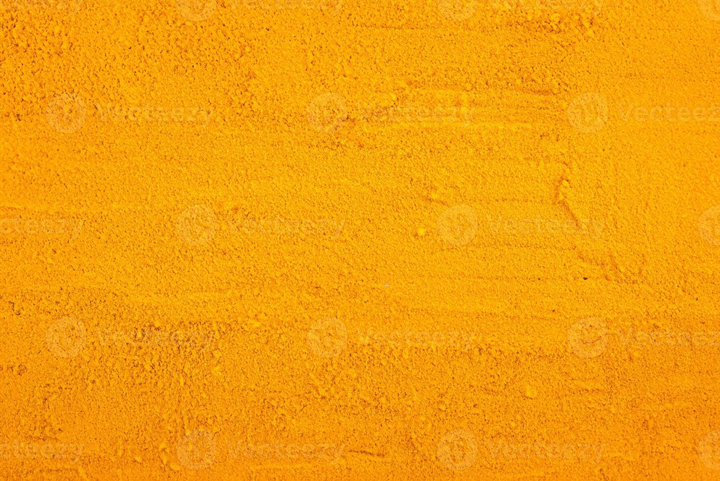 Vibrant Turmeric Powder, A Captivating Background for Culinary and Wellness Concepts photo