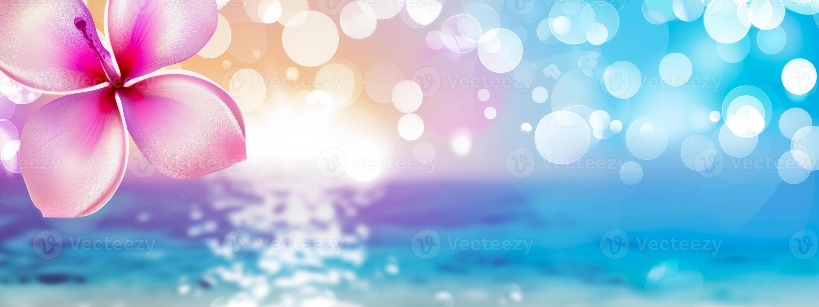Bright summer tropical floral background with vibrant flowers and Bokeh effect. Colorful botanical wallpaper. Wide banner. Copy space. Mockup for design. Tropical beauty. Summer vibes photo