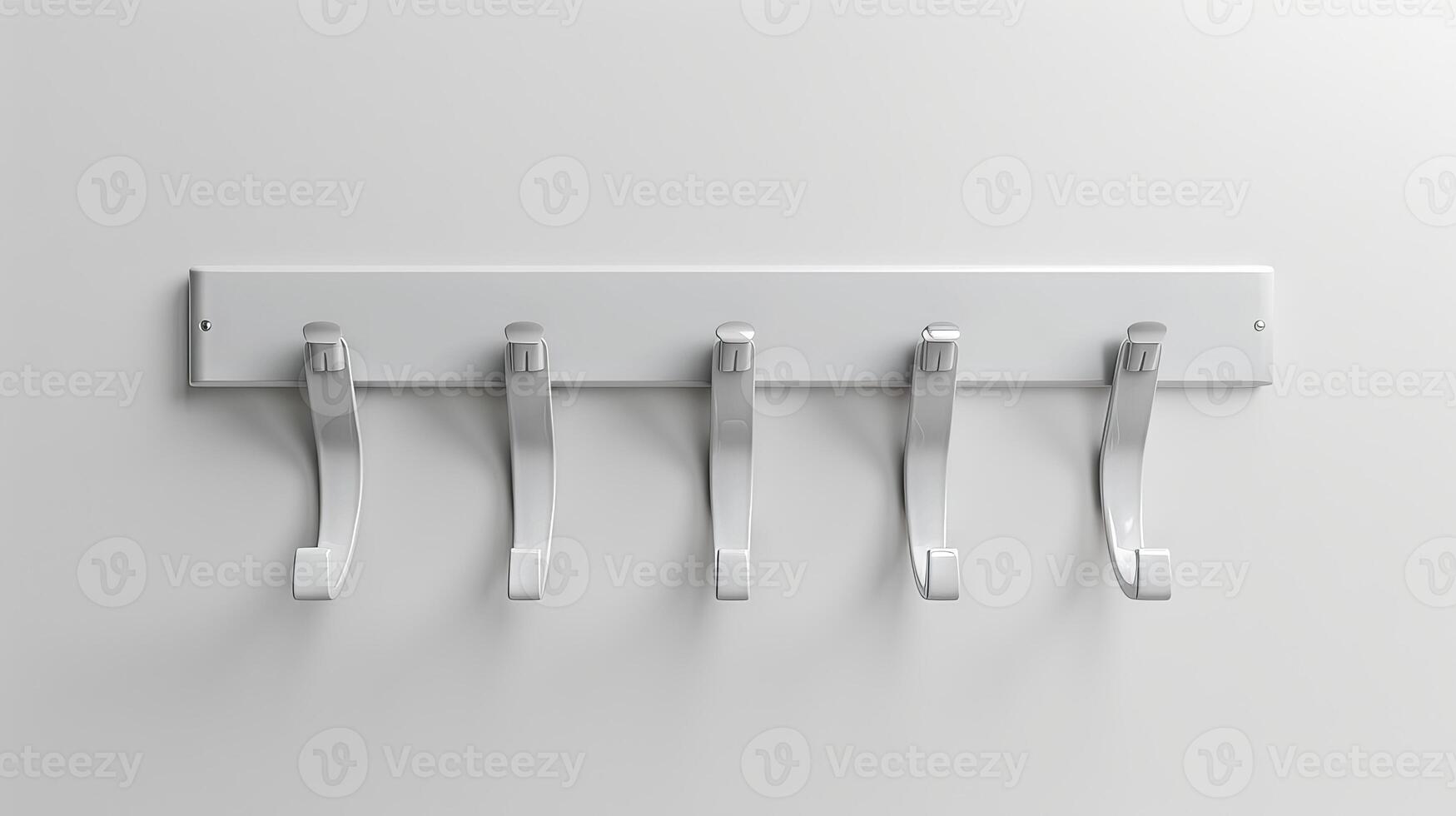 White wall-mounted coat rack with five hooks in a minimalist design. Home organization, storage solution, modern interior, simple design photo