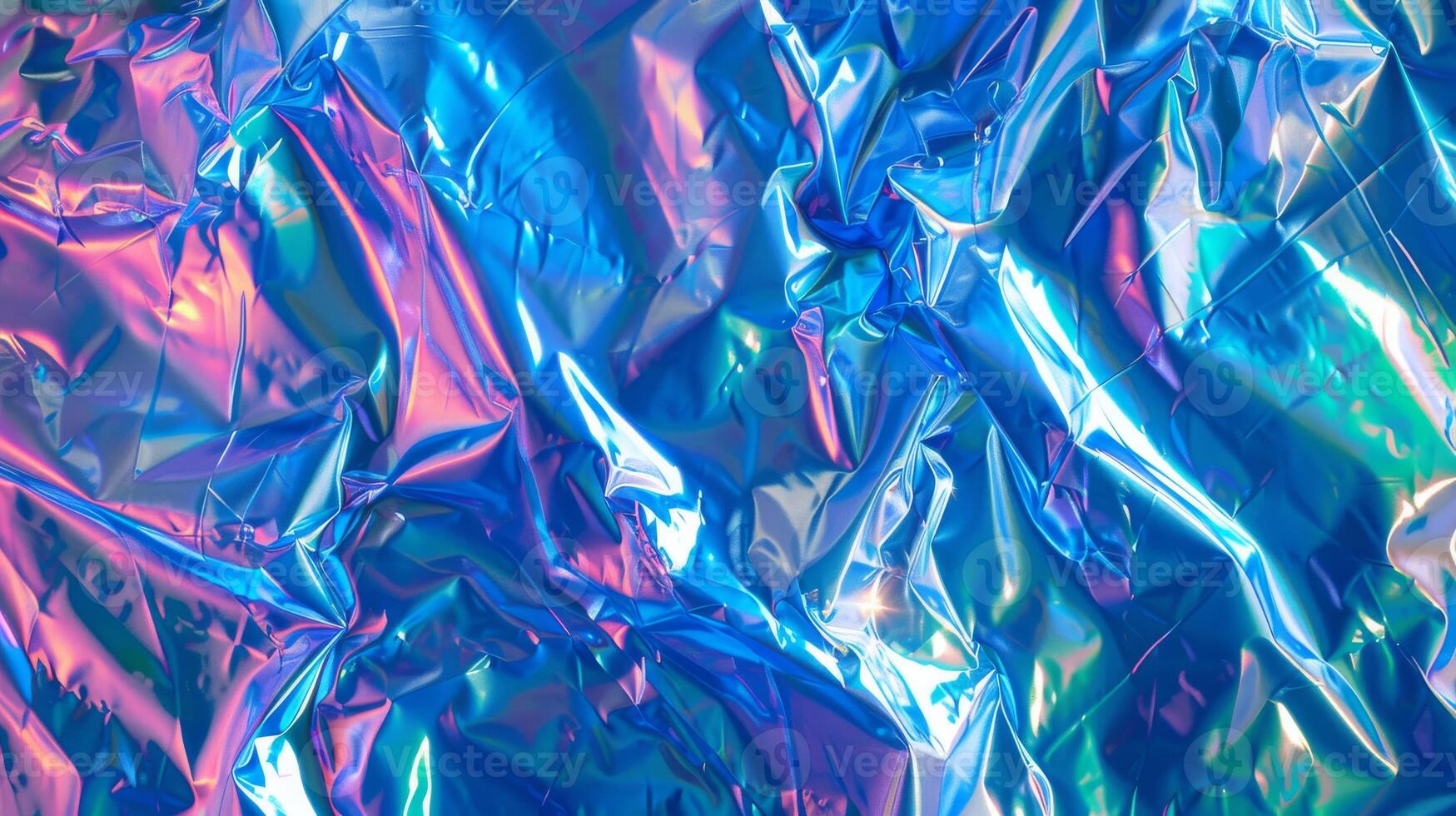 Iridescent Blue and Pink Metallic Wrinkled Foil Background with Vibrant Holographic Effect photo