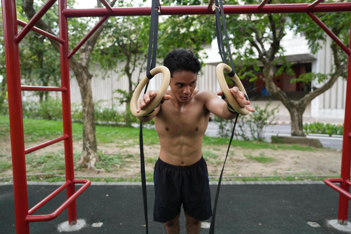 Asian men practicing swimming and polo and stretching and resting for water sports. photo