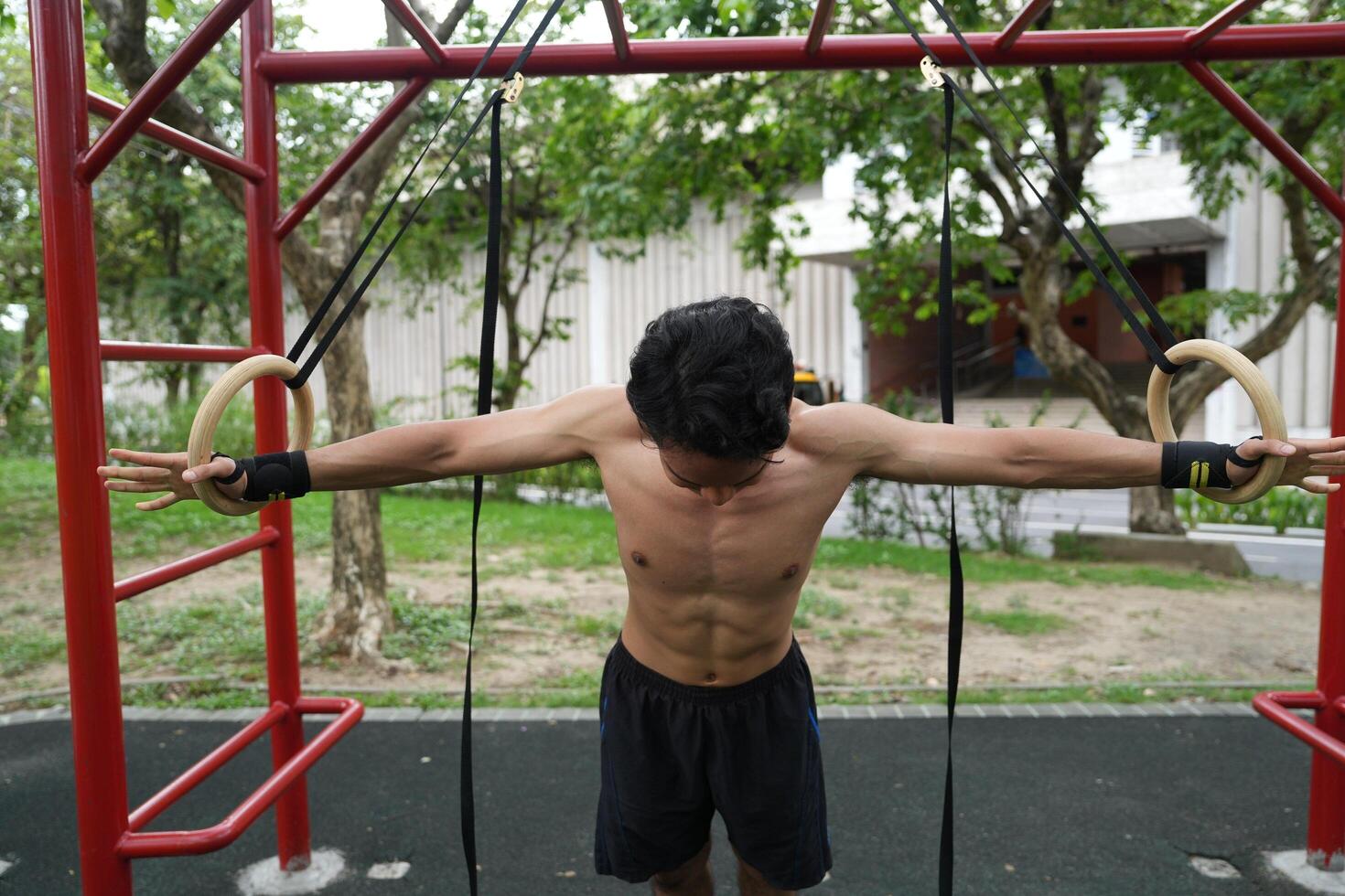 Asian men practicing swimming and polo and stretching and resting for water sports. photo