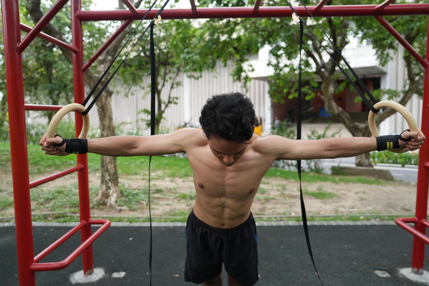 Asian men practicing swimming and polo and stretching and resting for water sports. photo