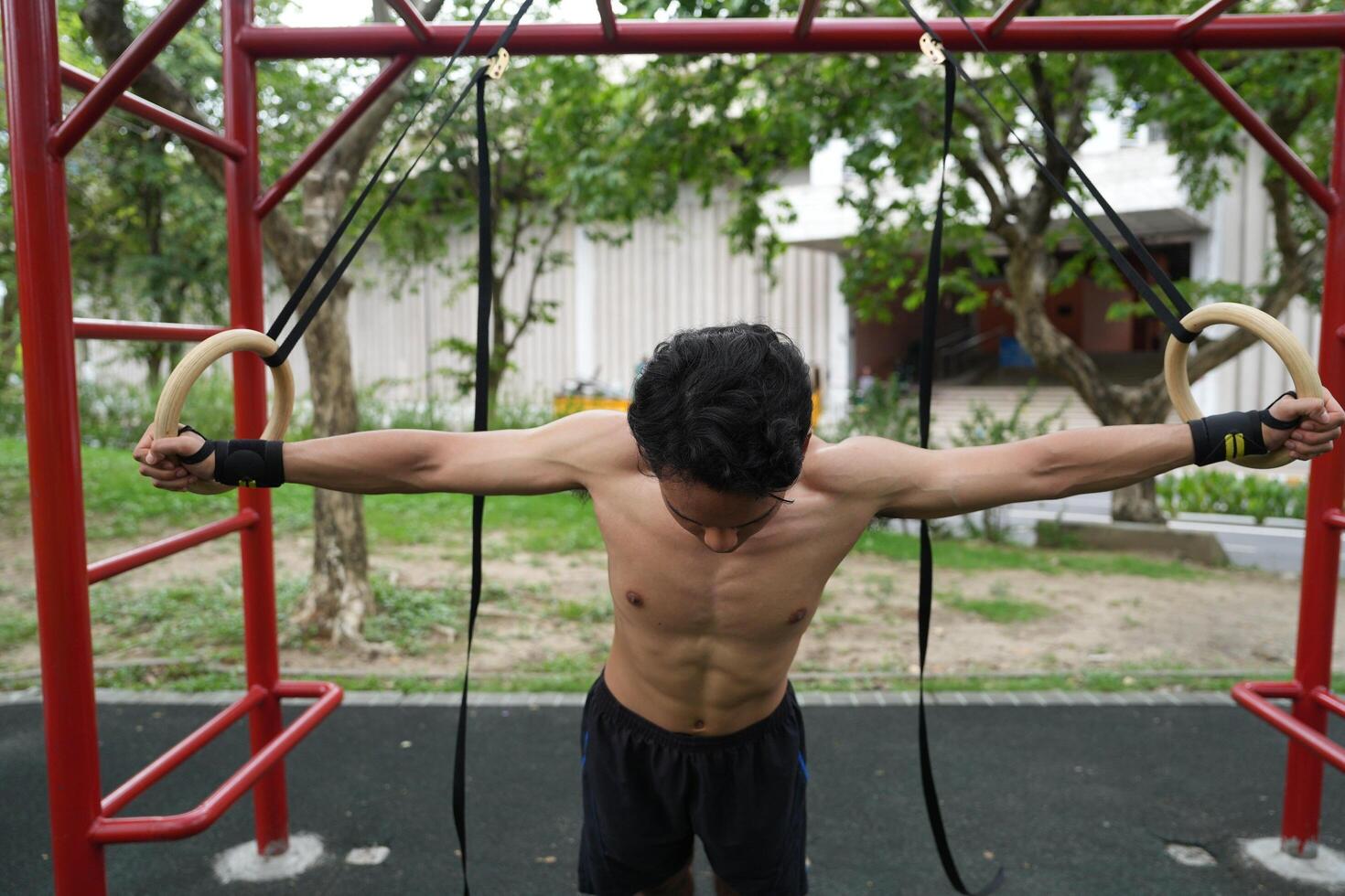 Asian men practicing swimming and polo and stretching and resting for water sports. photo