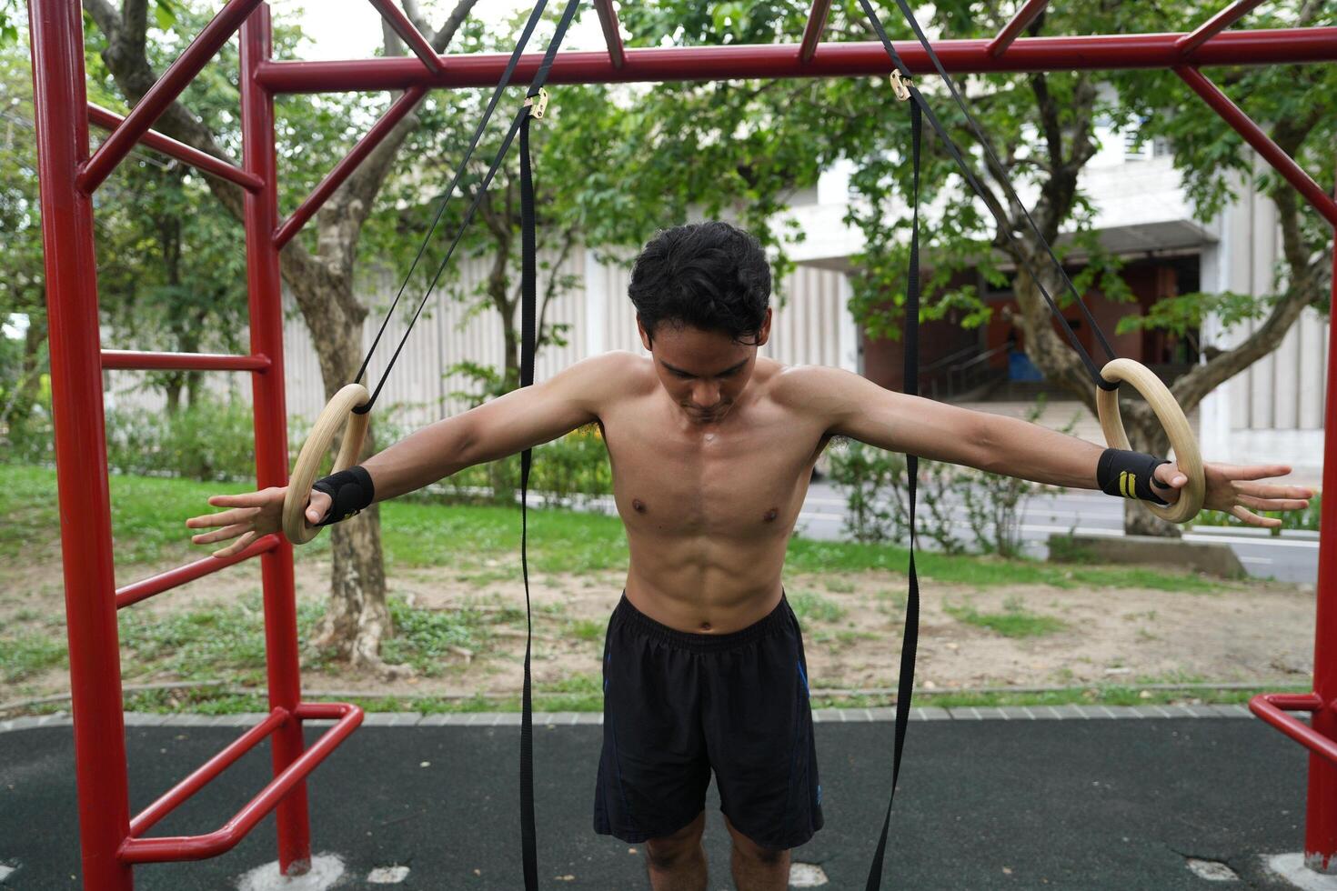 Asian men practicing swimming and polo and stretching and resting for water sports. photo