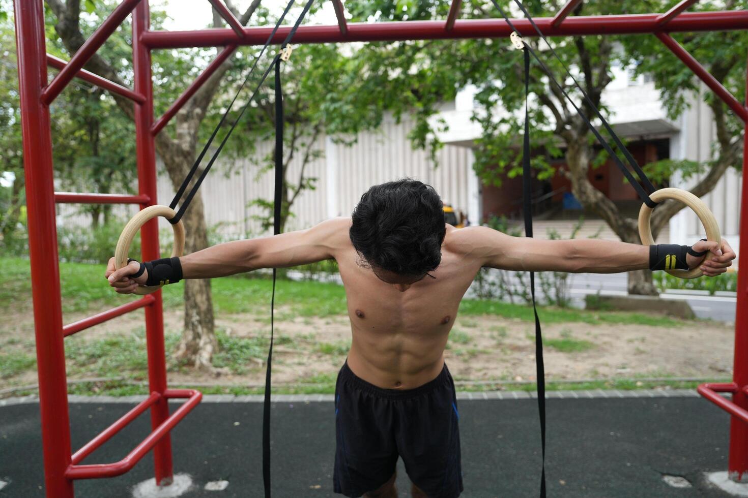 Asian men practicing swimming and polo and stretching and resting for water sports. photo