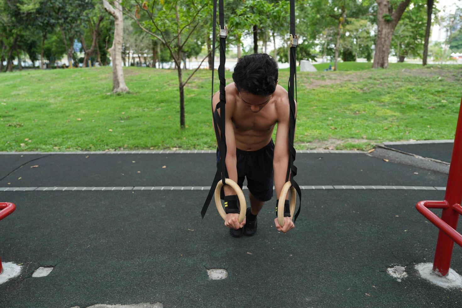 Asian men practicing swimming and polo and stretching and resting for water sports. photo