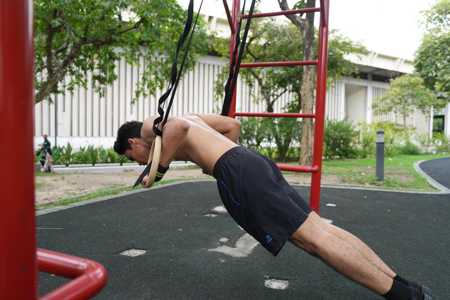 Asian men practicing swimming and polo and stretching and resting for water sports. photo