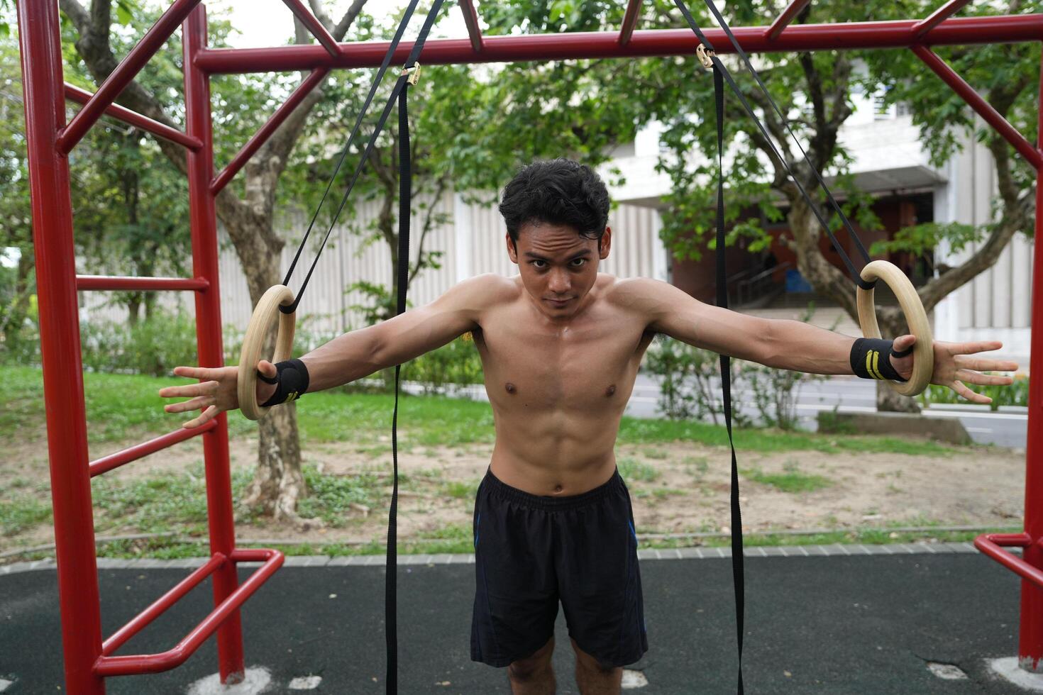 Asian men practicing swimming and polo and stretching and resting for water sports. photo
