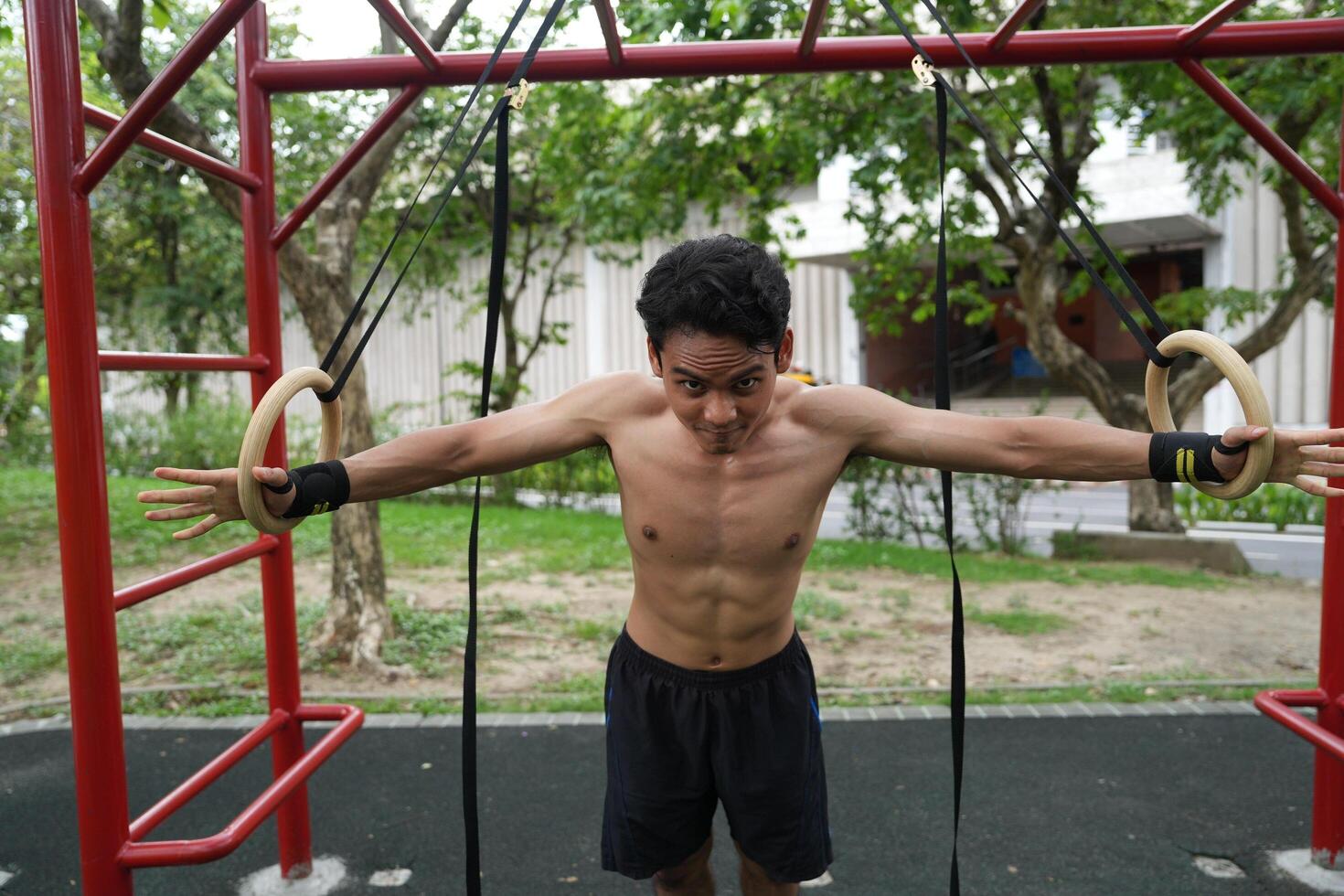 Asian men practicing swimming and polo and stretching and resting for water sports. photo