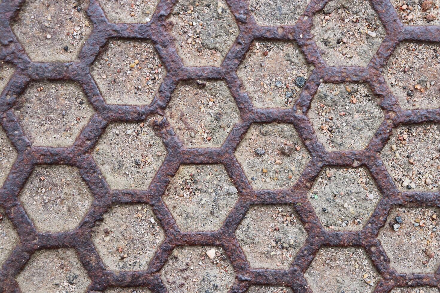 Rusty Road Hatch. Iron Manhole Urban Art. photo