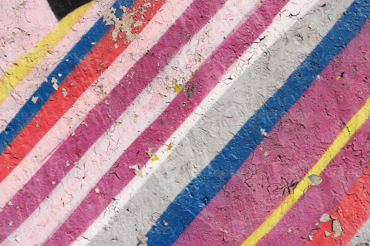 Weathered Graffiti Wall. Urban Street Art Beauty. Texture Backgr photo