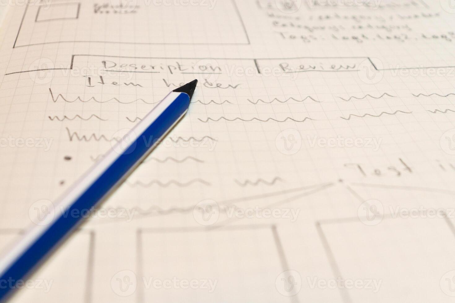 Online shop single page prototyping sketch with blue pencil. Web photo