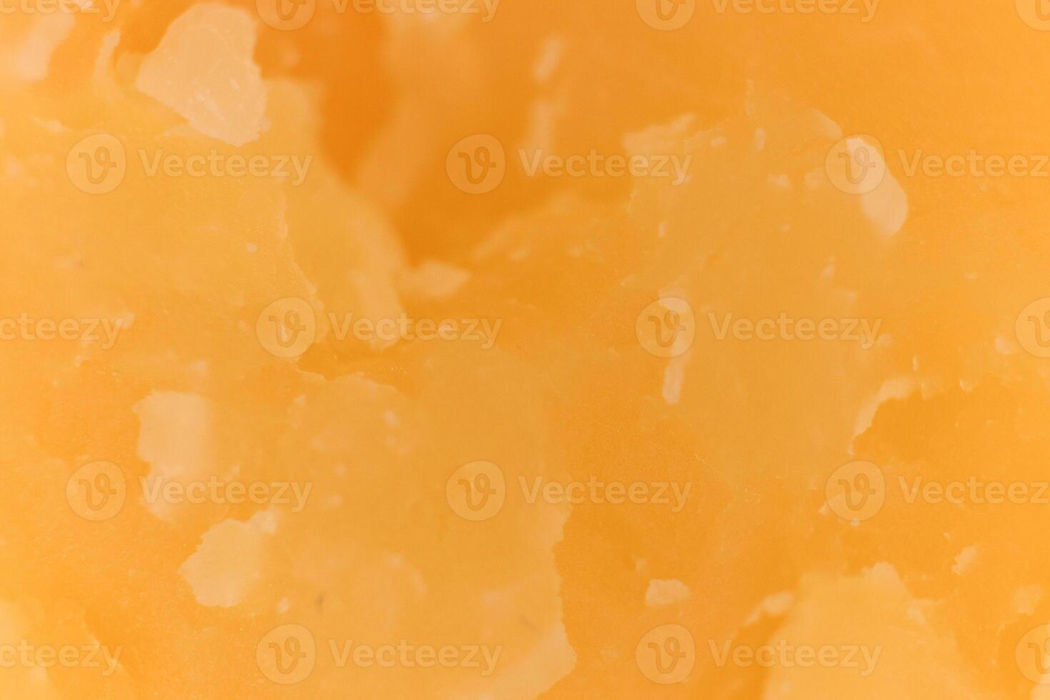 Solid Cheese macro closeup. Background Texture. photo