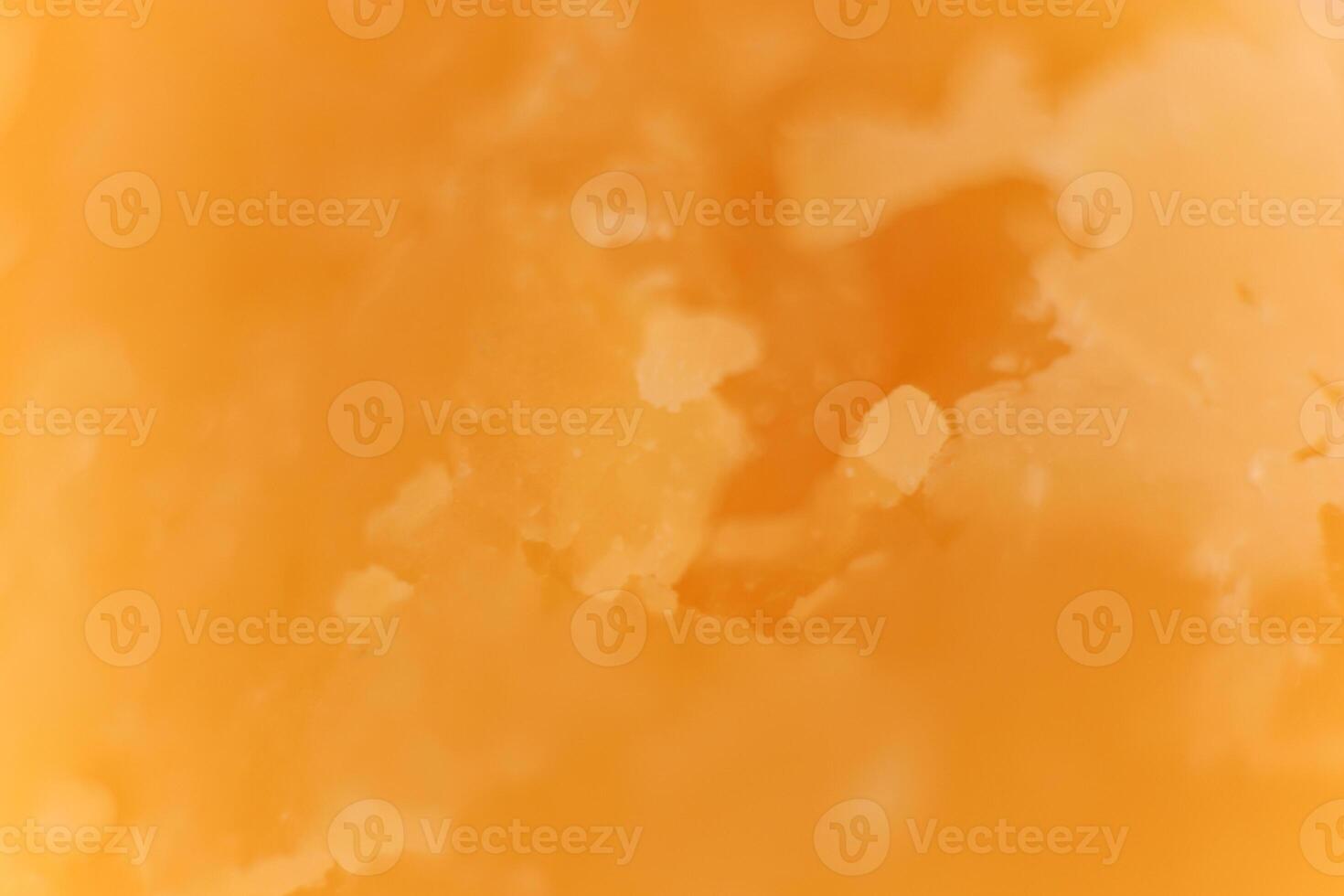Solid Cheese macro closeup. Background Texture. photo